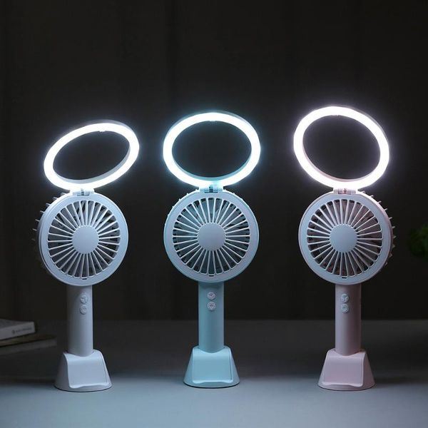 electric fans 3 in 1 5v mini usb handheld deskfan modes cooling wind speed led light phone holder
electric fans 3 in 1 5v mini usb handheld deskfan modes cooling wind speed led light phone holder