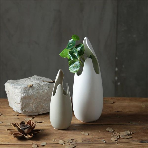 vases nordic modern ceramic vase home decor handicrafts dried flowers hydroponic flower table coffee dining soft art figurines 
vases nordic modern ceramic vase home decor handicrafts dried flowers hydroponic flower table coffee dining soft art figurines