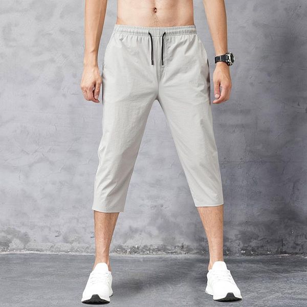 men's shorts 2021 solid color capris ice pants quick drying sports men jogging silk casual sweat, White;black
men's shorts 2021 solid color capris ice pants quick drying sports men jogging silk casual sweat, White;black