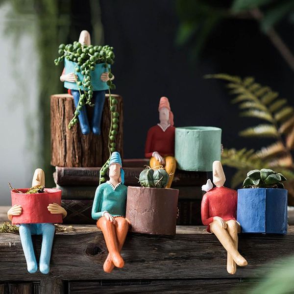 abstract cartoon character resin flower pot creative succulent planting container pastoral style ornament green plant decoration vases
abstract cartoon character resin flower pot creative succulent planting container pastoral style ornament green plant decoration vases