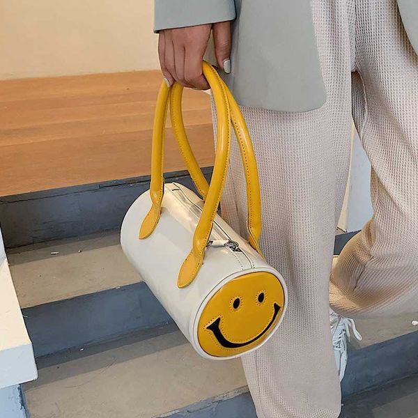 smiling face shoulder bag: personalized cylindrical handbag for women with long handles & pockets; 2 color options
smiling face shoulder bag: personalized cylindrical handbag for women with long handles & pockets; 2 color options