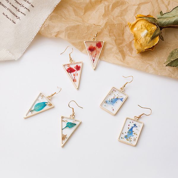 selling s925 silver needle korean version transparent dripping glue dry immortal leaf flower earrings square creative geometric fashion
selling s925 silver needle korean version transparent dripping glue dry immortal leaf flower earrings square creative geometric fashion