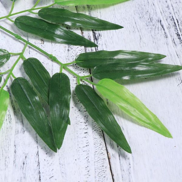 12pcs artificial green bamboo leaves fake plants greenery for home el office decoration decorative flowers & wreaths
12pcs artificial green bamboo leaves fake plants greenery for home el office decoration decorative flowers & wreaths