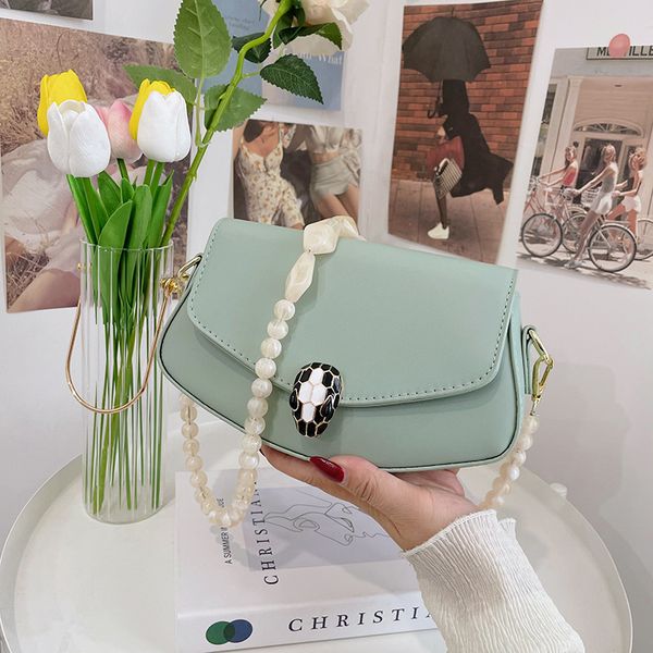 textured pearl chain single shoulder messenger underarm geometric women's 2021 new portable snakehead saddle bag
textured pearl chain single shoulder messenger underarm geometric women's 2021 new portable snakehead saddle bag