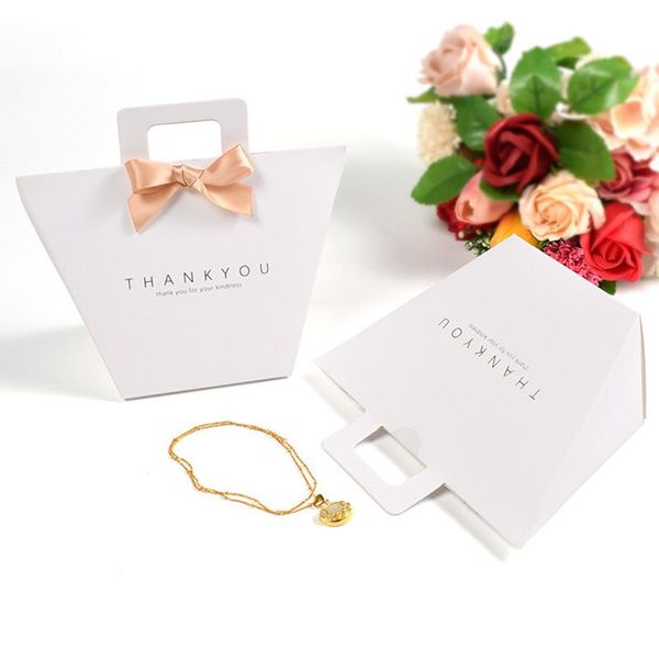 gift wrap 50pcs white thank you packaging candy dragee kraft paper bag wedding favors box birthday party favor bags with ribbon
gift wrap 50pcs white thank you packaging candy dragee kraft paper bag wedding favors box birthday party favor bags with ribbon