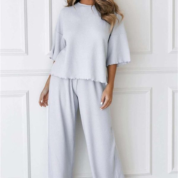 2021 summer new women's wear home solid color short sleeve pants casual two-piece set, Black;white
2021 summer new women's wear home solid color short sleeve pants casual two-piece set, Black;white