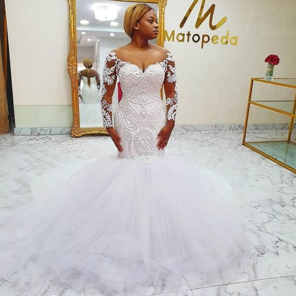 lace mermaid wedding dresses major beaded vestidos long sleeves sheer neck bridal dress sheer long sleeves plus size wedding gow, White
lace mermaid wedding dresses major beaded vestidos long sleeves sheer neck bridal dress sheer long sleeves plus size wedding gow, White