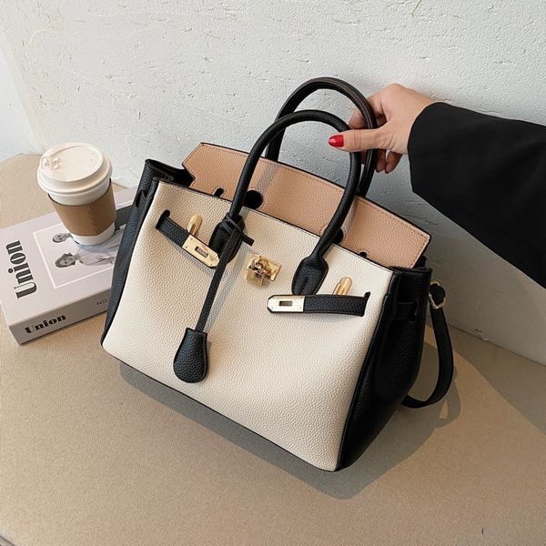 design s new style street pgraphy contrast color portable one shoulder oblique cross fashion women's bag
design s new style street pgraphy contrast color portable one shoulder oblique cross fashion women's bag