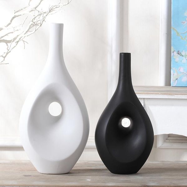vases black and white art abstract flower vase ceramic figurines modern minimalist home decor crafts room decoration furnishings
vases black and white art abstract flower vase ceramic figurines modern minimalist home decor crafts room decoration furnishings