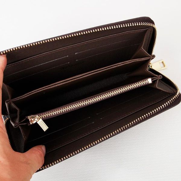 wallets luxury designer long zippy women man wallet pu leather zipper pocket inside card slots design1, Red;black
wallets luxury designer long zippy women man wallet pu leather zipper pocket inside card slots design1, Red;black