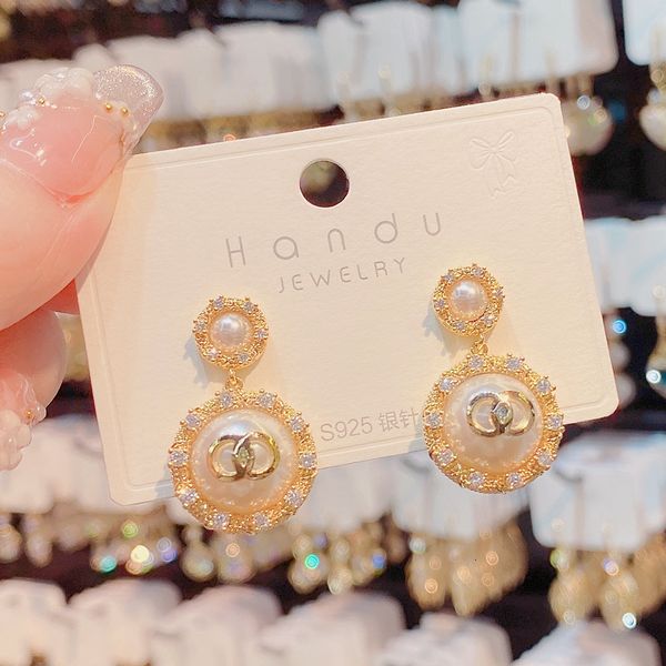 dangle earrings korean temperament simple micro inlaid letter cd round pearl female sweet, gentle and elegant silver needle
dangle earrings korean temperament simple micro inlaid letter cd round pearl female sweet, gentle and elegant silver needle