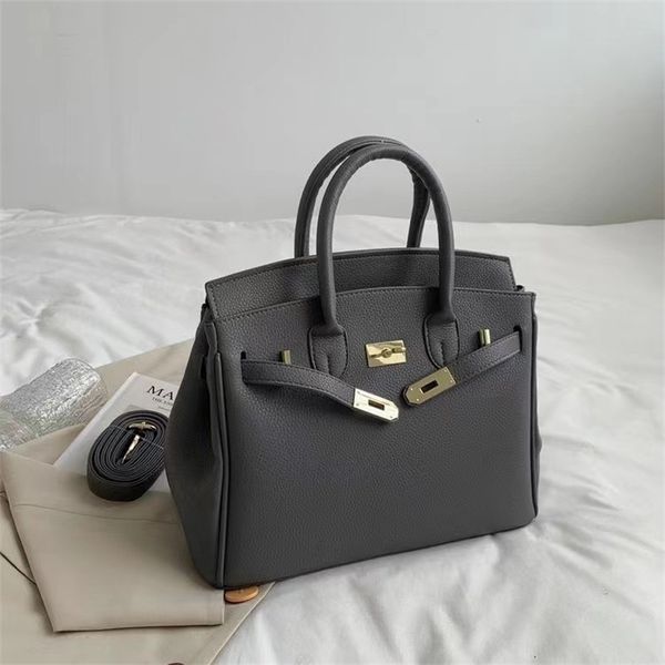 factory store 65% off clearance sale bags large bag solid color single shoulder messenger handbag female, Black;red
factory store 65% off clearance sale bags large bag solid color single shoulder messenger handbag female, Black;red