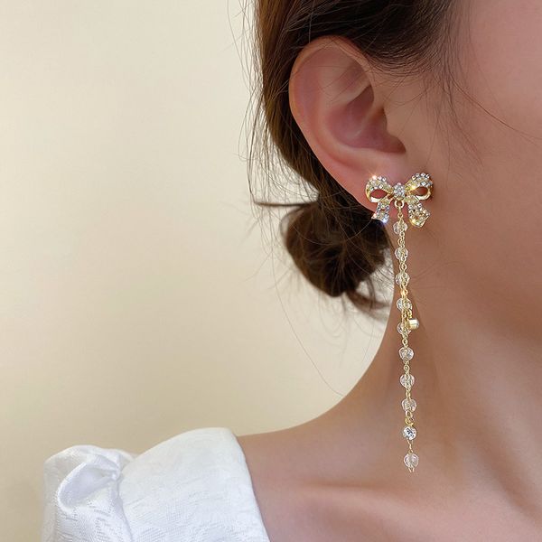 925 silver needle diamond pearl bow crystal long earrings fashion personalized earrings fresh forest earrings for women, Golden;silver
925 silver needle diamond pearl bow crystal long earrings fashion personalized earrings fresh forest earrings for women, Golden;silver