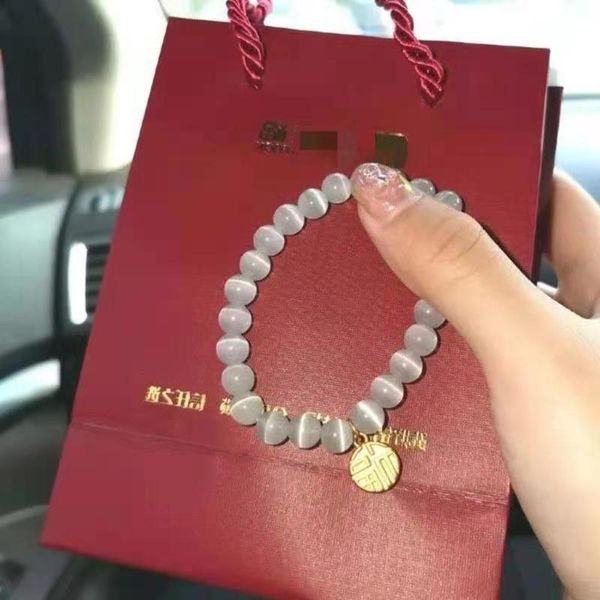 hand catenary the same cat's-eye stone bracelet, fu brand sand gold pendant, pearl bracelet means year's gift does not fade, Black
hand catenary the same cat's-eye stone bracelet, fu brand sand gold pendant, pearl bracelet means year's gift does not fade, Black