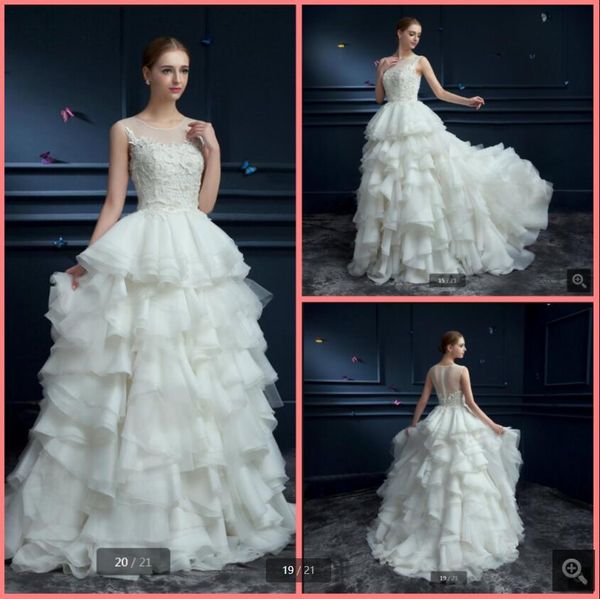 robe de soiree 2021 white organza ball gown wedding dresses ruffled lace appliques pearls sleeveless princess puffy bride dress sheer back e
robe de soiree 2021 white organza ball gown wedding dresses ruffled lace appliques pearls sleeveless princess puffy bride dress sheer back e