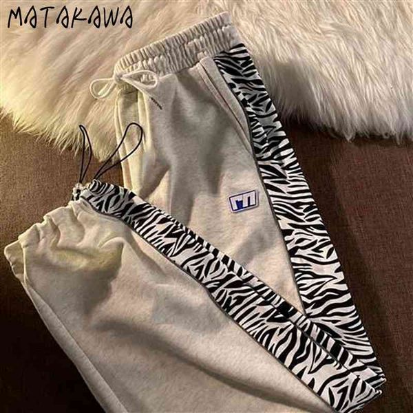matakawa streetwear women striped side thin loose straight sports pants for women drawstring pants ins sweatpants women 210513, Black;white
matakawa streetwear women striped side thin loose straight sports pants for women drawstring pants ins sweatpants women 210513, Black;white
