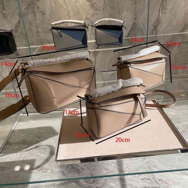 design hand women's 2021 new stitching geometric large leather pillow color matching small portable messenger shoulder bag
design hand women's 2021 new stitching geometric large leather pillow color matching small portable messenger shoulder bag