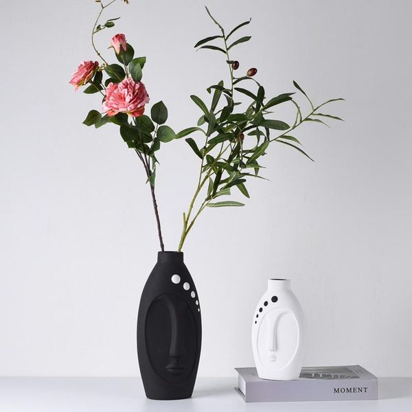 nordic minimalist black and white facing ceramic vase decoration model room living creative home vases
nordic minimalist black and white facing ceramic vase decoration model room living creative home vases