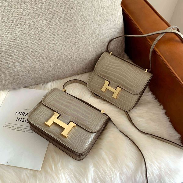 wholesale leather tofu women's head button pattern small square mini stewardess bag luxurys designers bag
wholesale leather tofu women's head button pattern small square mini stewardess bag luxurys designers bag