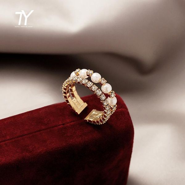 french romantic double and triple pearl zircon rings for woman 2021 korean fashion jewelry gothic party girl's unusual ring set cluster, Golden;silver
french romantic double and triple pearl zircon rings for woman 2021 korean fashion jewelry gothic party girl's unusual ring set cluster, Golden;silver