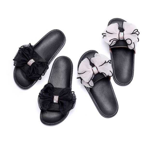 summer women slippers bow crystal beach slides sandals female lace pvc sole flat with 36-41 sizes, Black 
summer women slippers bow crystal beach slides sandals female lace pvc sole flat with 36-41 sizes, Black