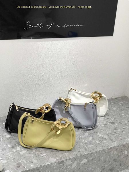 big hardware button solid color underarm 2021 spring new korean fashion portable one shoulder messenger bag
big hardware button solid color underarm 2021 spring new korean fashion portable one shoulder messenger bag