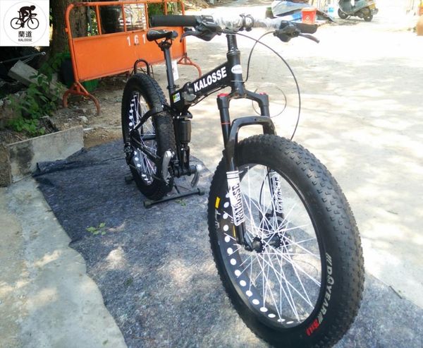 kalosse folding fat bike 165mm travel 24/27/30 speed snow mountain bicycle 26*4.0 inch bikes
kalosse folding fat bike 165mm travel 24/27/30 speed snow mountain bicycle 26*4.0 inch bikes