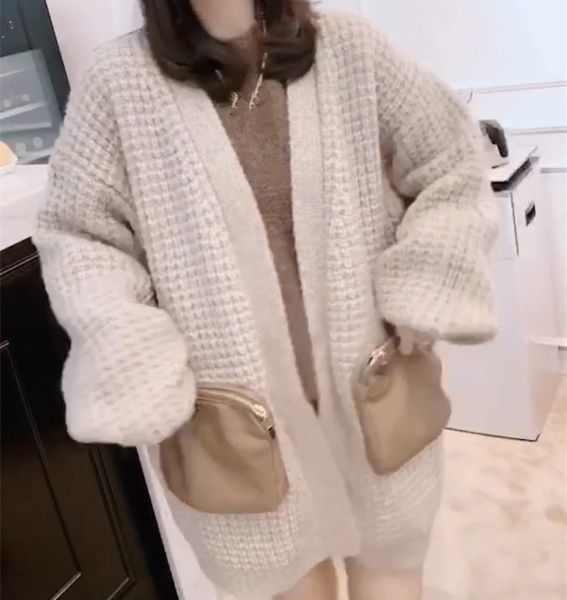 european sweater pocket zipper coat women's autumn and winter new loose large fashionable knitted cardigan, White
european sweater pocket zipper coat women's autumn and winter new loose large fashionable knitted cardigan, White