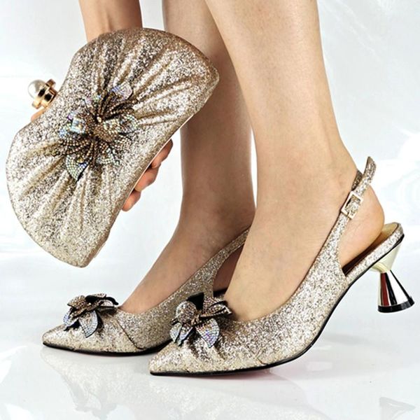 classics african women royal wedding party shoes and bag to match with shinning crystal in golden color italian style set dress, Black
classics african women royal wedding party shoes and bag to match with shinning crystal in golden color italian style set dress, Black