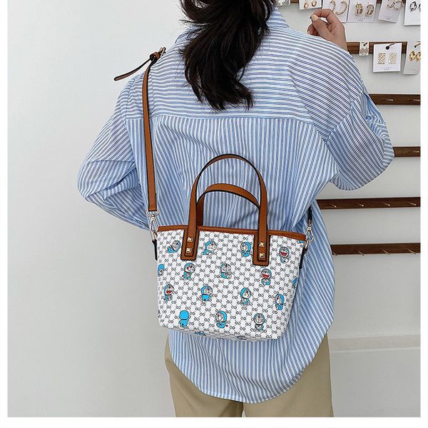 big bag 2021 new fashion women's commuter hand large capacity one shoulder tote cartoon animation
big bag 2021 new fashion women's commuter hand large capacity one shoulder tote cartoon animation