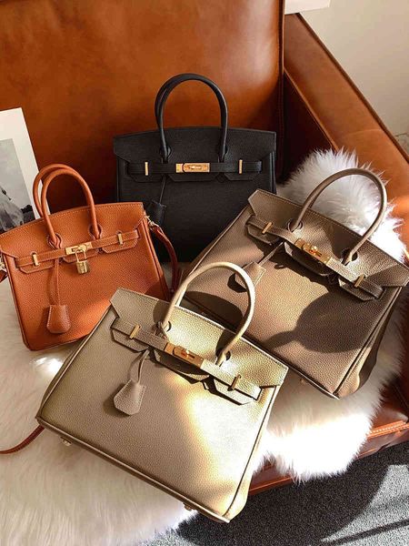 wholesale togo cowhide carry single layer shoulder cross lychee women's leather large capacity bag luxurys designers bag
wholesale togo cowhide carry single layer shoulder cross lychee women's leather large capacity bag luxurys designers bag