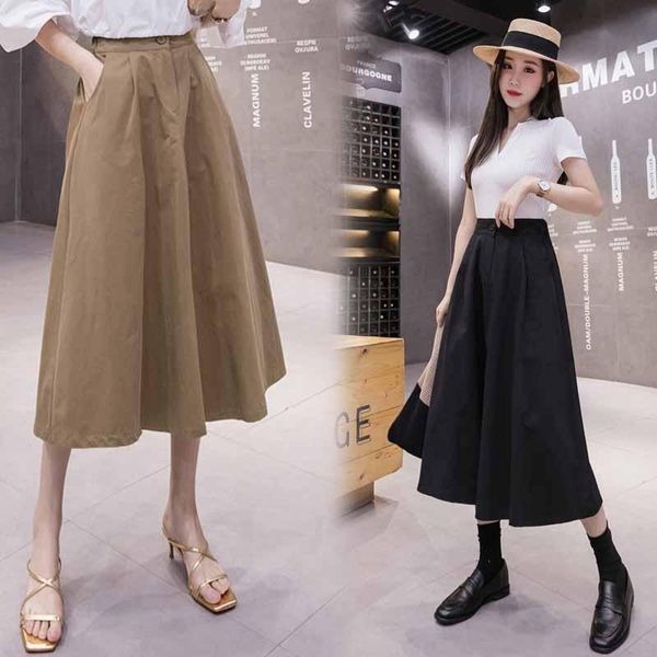 skirts elastic a word skirt of tall waist show long money holding up her full-skirted in the thin black umbrella
skirts elastic a word skirt of tall waist show long money holding up her full-skirted in the thin black umbrella