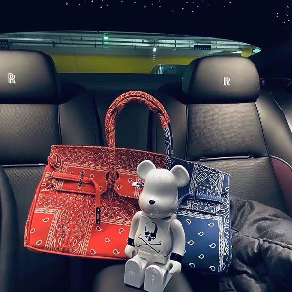 net red color matching printed cashew nut splicing one shoulder portable messenger bag daxin
net red color matching printed cashew nut splicing one shoulder portable messenger bag daxin