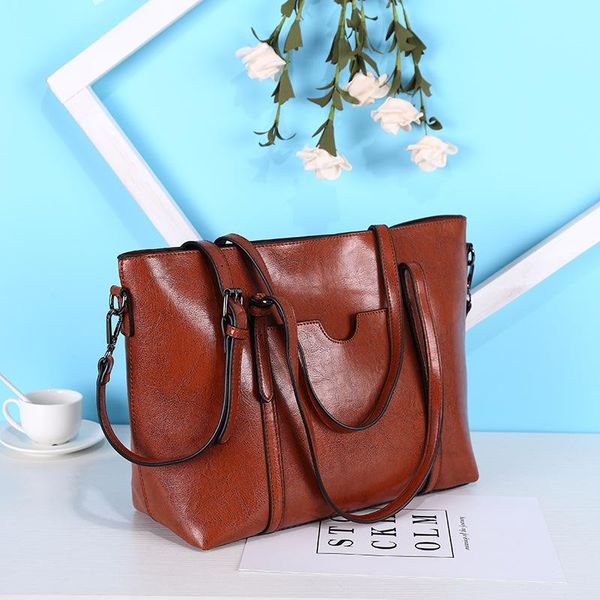 style women's bag european and american fashion oil wax leather portable one shoulder slanting simple tote clutch bags
style women's bag european and american fashion oil wax leather portable one shoulder slanting simple tote clutch bags