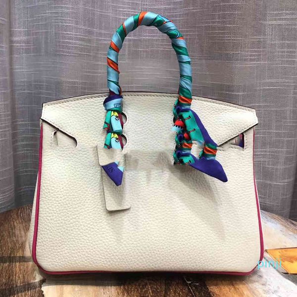 designer 2021 new white with red edge contrast color first layer cowhide female hand messenger fashion waveluxury bag
designer 2021 new white with red edge contrast color first layer cowhide female hand messenger fashion waveluxury bag