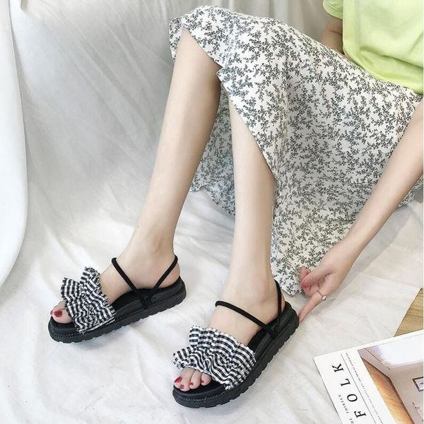 net red sandals female 2021 summer fairy wind student wild two wearing thick bottom sponge cake roman shoes, Black
net red sandals female 2021 summer fairy wind student wild two wearing thick bottom sponge cake roman shoes, Black
