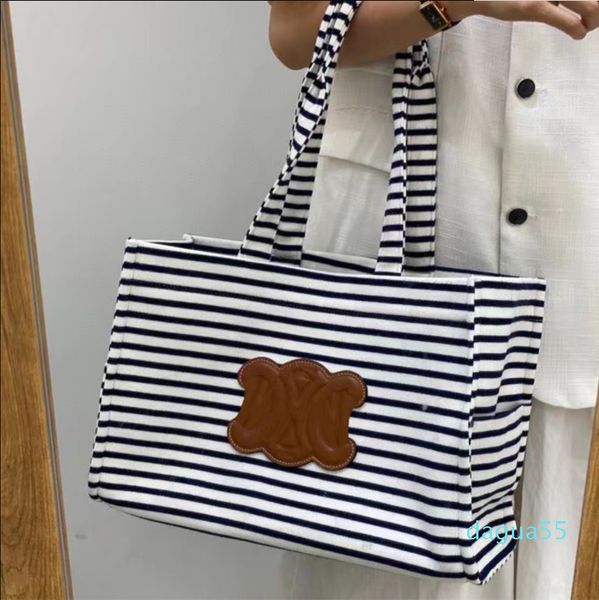 fashion backpack 2021 new arc de stripe canvas large capacity tot mommy shopping single shoulder portable women's bag
fashion backpack 2021 new arc de stripe canvas large capacity tot mommy shopping single shoulder portable women's bag