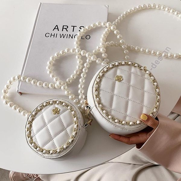 shoulder bags pearl chain texture women's small bag pu 2021 fashion trend messenger high-end round zipper
shoulder bags pearl chain texture women's small bag pu 2021 fashion trend messenger high-end round zipper