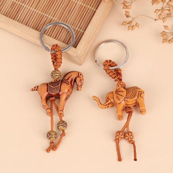 hooks & rails 2pc lucky women's elephant carving wooden pendant keychain for mujer charms car bag accessories
hooks & rails 2pc lucky women's elephant carving wooden pendant keychain for mujer charms car bag accessories