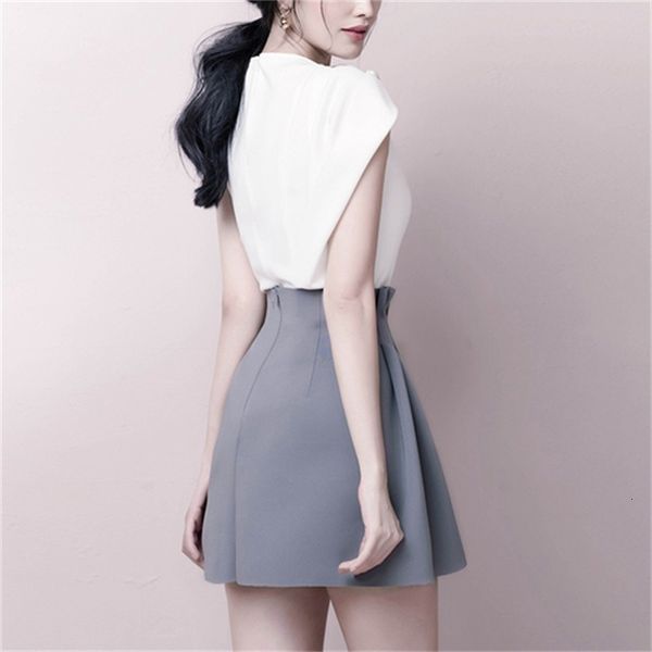 two piece dress a two-piece women's suit, white sleeveless shirt, irregular hem and asymmetric blue skirt, 2021
two piece dress a two-piece women's suit, white sleeveless shirt, irregular hem and asymmetric blue skirt, 2021