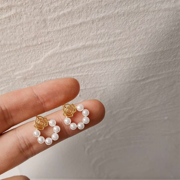 s925 silver needle creative hollow three dimensional rose japanese and korean temperament pearl net red earrings, Black
s925 silver needle creative hollow three dimensional rose japanese and korean temperament pearl net red earrings, Black