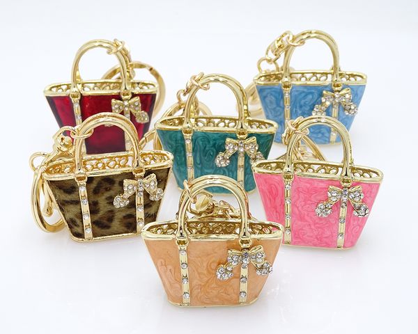 Creative jewelry key chain set rhinestone handbag car keychain female bag accessories key chain metal enamel pendant small gift
Creative jewelry key chain set rhinestone handbag car keychain female bag accessories key chain metal enamel pendant small gift