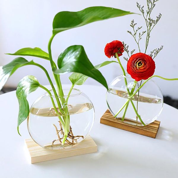 vases solid wood glass vase borosilicate fashion bottle sturdy office creative beautiful plant
vases solid wood glass vase borosilicate fashion bottle sturdy office creative beautiful plant