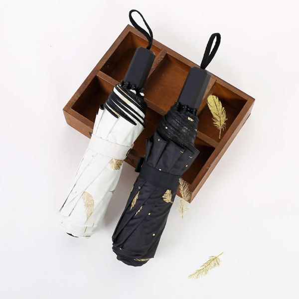 gilded feather black gum sunshade creative small fresh umbrella folding sunscreen three fold
gilded feather black gum sunshade creative small fresh umbrella folding sunscreen three fold