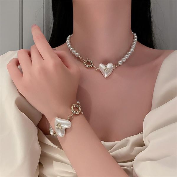 chokers luxury pearl heart pendant necklace beaded choker for women girls fashion elegant temperament love clavicle chain jewelry, Golden;silver
chokers luxury pearl heart pendant necklace beaded choker for women girls fashion elegant temperament love clavicle chain jewelry, Golden;silver
