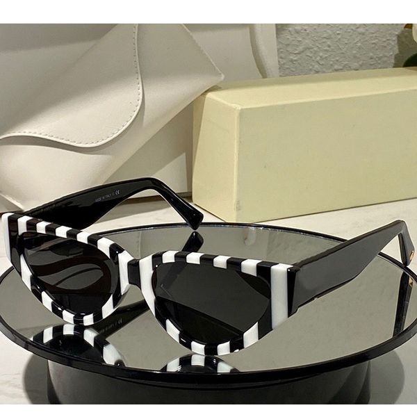 cat eye sunglasses black and white striped frame womans 4063 fashion classic style woman shopping travel vacation glasses uv400 protection d, White;black
cat eye sunglasses black and white striped frame womans 4063 fashion classic style woman shopping travel vacation glasses uv400 protection d, White;black