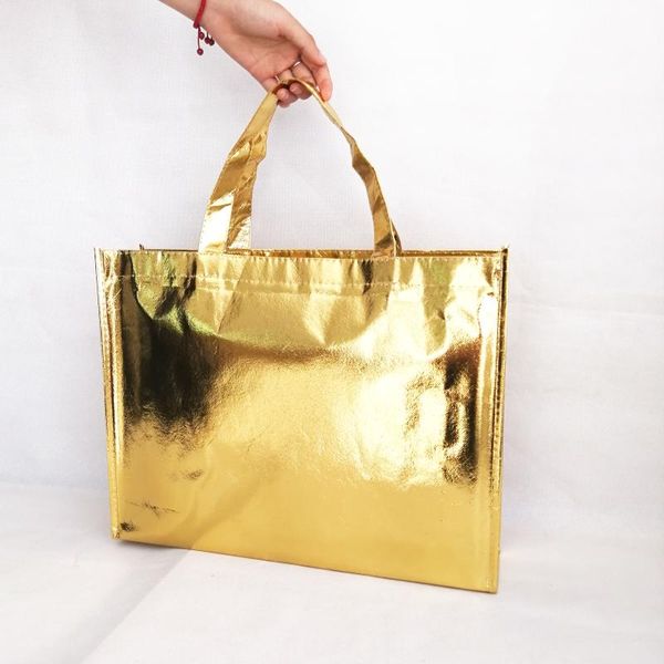 gift wrap shining wrapping bags handled metallic gold pp non woven fabric tote bag clothes shoes wigs boutique favors festival event
gift wrap shining wrapping bags handled metallic gold pp non woven fabric tote bag clothes shoes wigs boutique favors festival event