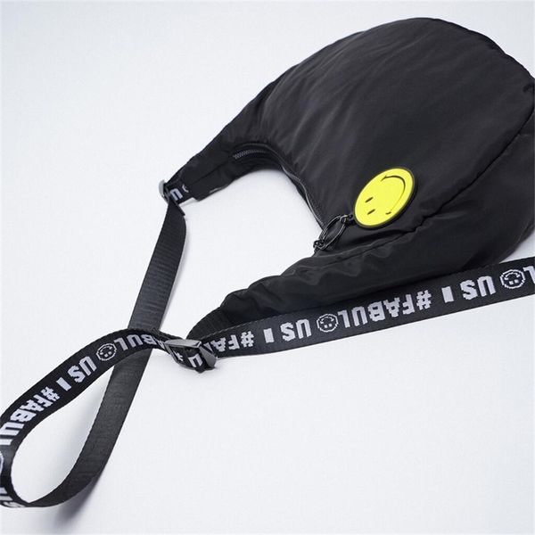 za messenger 2021 new women's fashion simple black smiling face pendant letter strap single shoulder bag
za messenger 2021 new women's fashion simple black smiling face pendant letter strap single shoulder bag