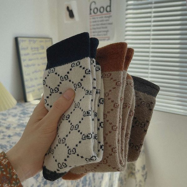 double wool thickened autumn and winter versatile college women's socks warm pile, Black;white
double wool thickened autumn and winter versatile college women's socks warm pile, Black;white