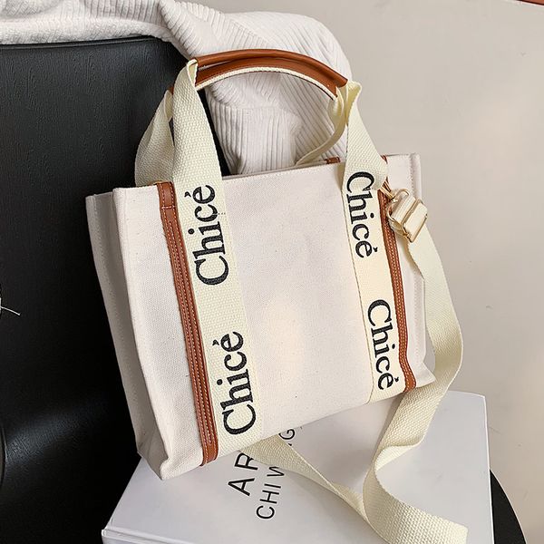 kpop casual canvas women handbag large capacity female shoulder bag travel big totes printed letters ladies messenger bag l003
kpop casual canvas women handbag large capacity female shoulder bag travel big totes printed letters ladies messenger bag l003